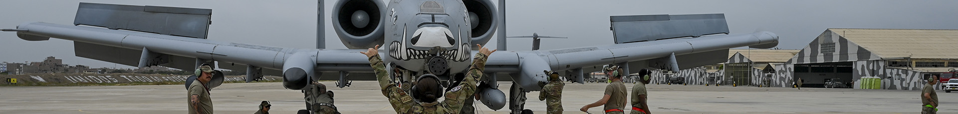 U.S. Air Force Maj. Janet Czipo, a logistics officer deployed from 10th Air Force Headquarters at Naval Air Station Joint Reserve Base Fort Worth, Texas, practices marshaling an A-10 Thunderbolt II as it returns from a mission July 12, 2023, at Chiclayo, Peru. Czipo handled a large part of the visa coordination process to get U.S. Airmen into Peru for exercise Patriot Fury. (U.S. Air Force photo by Master Sgt. Bob Jennings)