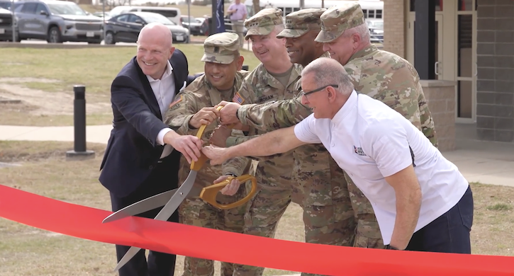 Military personnel ribbon cutting