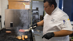 A chef in 42 Bistro cooking