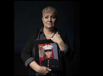 Link to Video: Virginia Cooper holding picture of her son Joshua James Wood