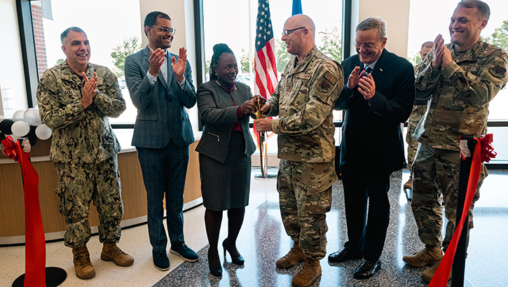 Military personnel celebrate opening of new clinic